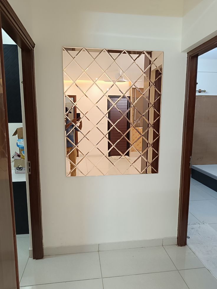 Antique mirror glass can be used as an alternative to traditional wall finishes,